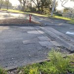 Before Image of Asphalt Carpark Repair at Lynwood High School in Lynwood, WA