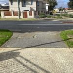 Before Image of Asphalt Driveway Crossover Repair in Riverton, WA