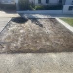 During Image of Asphalt Driveway Crossover Installation for Distinctive Homes in Subiaco, Western Australia